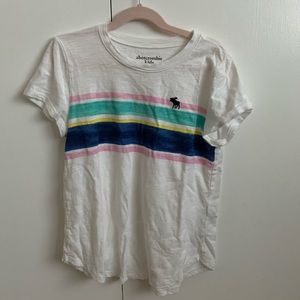 A white Abercrombie kids tee with a loose fit
